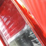 Oriģināls Nissan Navara II (D40) facelift aizmugurējais kreisais lukturis 26555EB38B