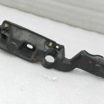 Renault Grand Scenic III Priekšējā kreisā dubļusarga nesēja kronšteins 631236764R