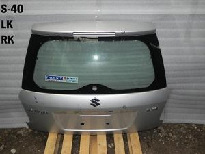 Suzuki SX4 SX-4 aizmugurējā bagāžnieka vāka krāsa sudraba ZCC