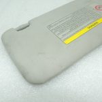 Oriģināls Toyota Avensis T25 saules aizsarglīdzeklis kreisajā pusē (ar brīdinājumu par gaisa spilvena atvēršanu) 7432005161161B1