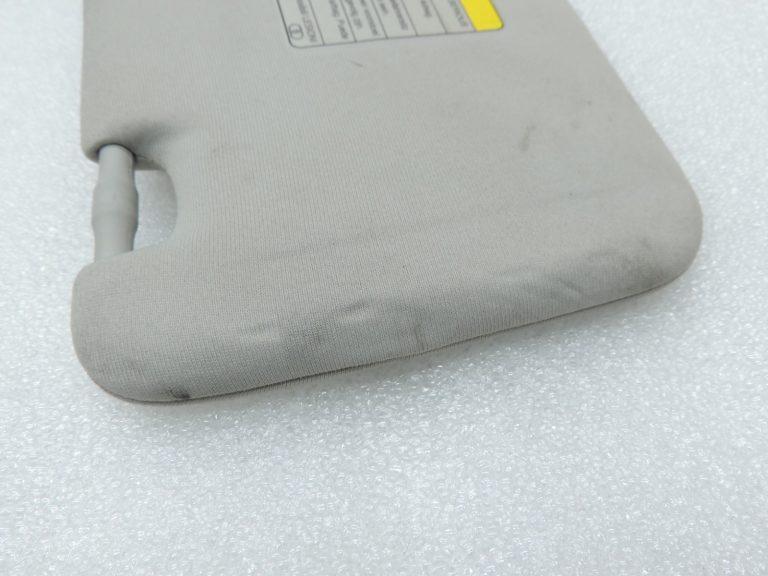Oriģināls Toyota Avensis T25 saules aizsarglīdzeklis kreisajā pusē (ar brīdinājumu par gaisa spilvena atvēršanu) 7432005161161B1