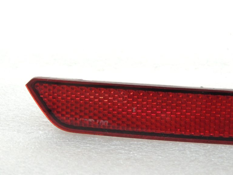 Volkswagen Tiguan II Aizmugurējā bampera kreisais atstarotājs 5NA945103 5NA945105A