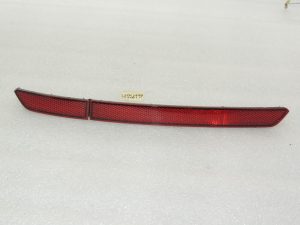 Volkswagen Tiguan II Aizmugurējā labā bampera atstarotājs 5NA945104 5NA945106A
