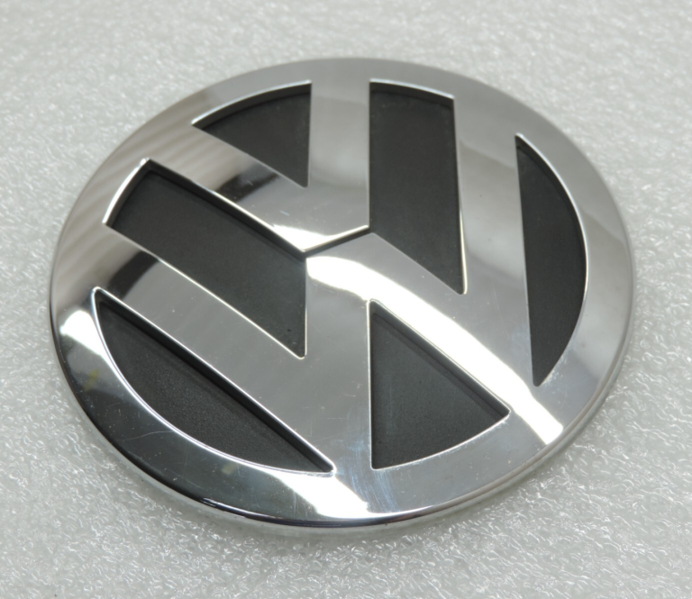 Oriģināls Volkswagen Tiguan 5N aizmugurējā vāka VW emblēma ar uzrakstu 3C9853630