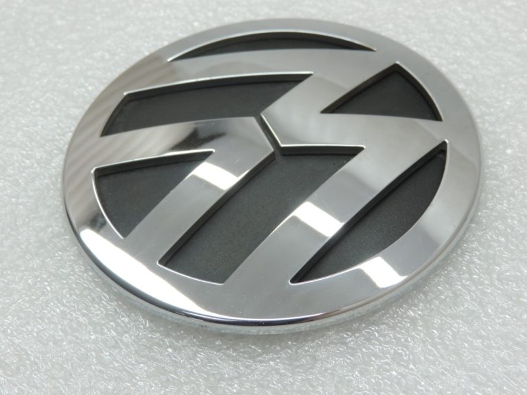 Oriģināls Volkswagen Tiguan 5N aizmugurējā vāka VW emblēma ar uzrakstu 3C9853630