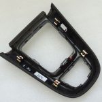 Opel Zafira C pārnesumu pārslēgšanas slēdža paneļa vāka rāmis 39077316