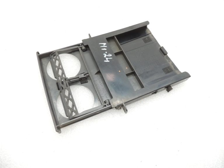 Mitsubishi L200 K7 K6 instrumentu paneļa krūzes turētājs MR206054