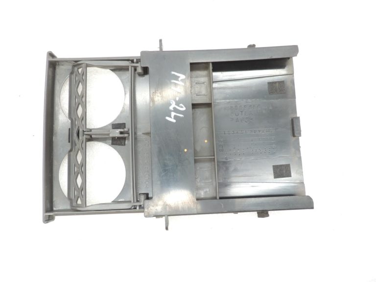 Mitsubishi L200 K7 K6 instrumentu paneļa krūzes turētājs MR206054