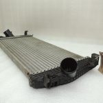 Chrysler Grand Voyager V starpdzesētājs (Intercooler) 4677732AD OEM