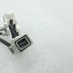Nissan Navara II D40 centrālā konsole – 12 V ligzda un USB/Aux vadu komplekts 240165X60B