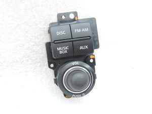 Nissan Navara II D40 radio navigācijas vadības slēdzis, kreisais 283955X00B