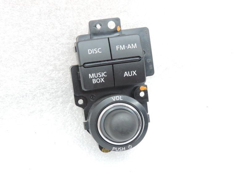 Nissan Navara II D40 radio navigācijas vadības slēdzis, kreisais 283955X00B