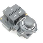 Nissan Navara II D40 radio navigācijas vadības slēdzis labajā pusē