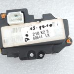 Nissan Navara II D40 radio navigācijas vadības slēdzis labajā pusē