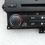 Nissan Navara II D40 klimata kontroles panelis, navigācijas sistēma, radio, instrumentu panelis 283955X00D