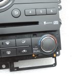 Nissan Navara II D40 klimata kontroles panelis, navigācijas sistēma, radio, instrumentu panelis 283955X00D