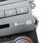 Nissan Navara II D40 klimata kontroles panelis, navigācijas sistēma, radio, instrumentu panelis 283955X00D