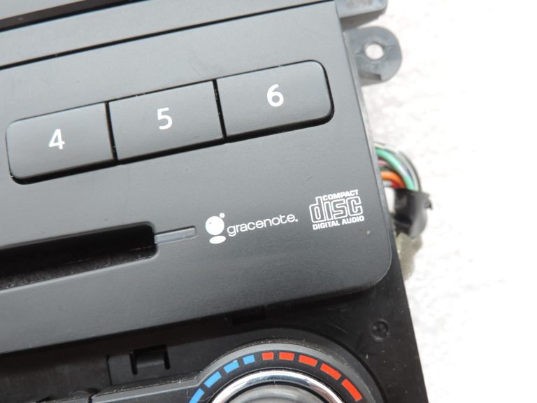 Nissan Navara II D40 klimata kontroles panelis, navigācijas sistēma, radio, instrumentu panelis 283955X00D