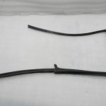 Nissan Navara II oriģinālais aizmugurējais kreisais loga blīvējums 82331EB320