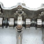OE Toyota 1,3i benzīns 1NR-FE 16v vārpstas ar vārpstas korpusu 1110347010