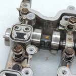 OE Toyota 1,3i benzīns 1NR-FE 16v vārpstas ar vārpstas korpusu 1110347010