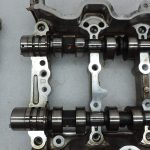 OE Toyota 1,3i benzīns 1NR-FE 16v vārpstas ar vārpstas korpusu 1110347010
