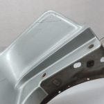 OE Mitsubishi Pajero V68W V64W V65W aizmugurējā kreisā bampera stūre MR548025