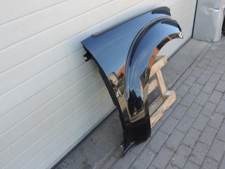 Nissan Navara II D40 priekšējais labais spārns, krāsa GN0, melns, F31004X0MA