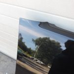 Nissan Navara II D40 priekšējais labais spārns, krāsa GN0, melns, F31004X0MA
