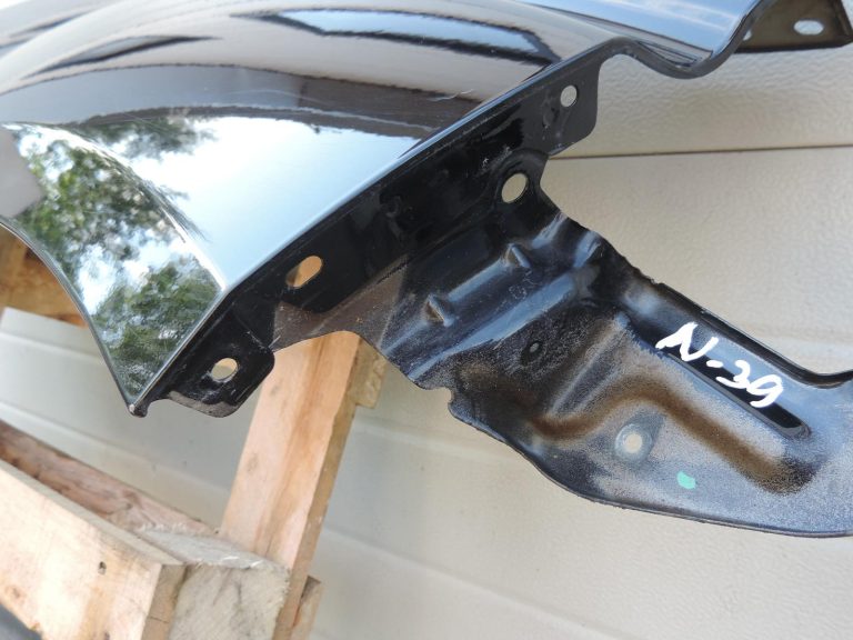 Nissan Navara II D40 priekšējais labais spārns, krāsa GN0, melns, F31004X0MA