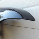 Nissan Navara II D40 priekšējais labais spārns, krāsa GN0, melns, F31004X0MA