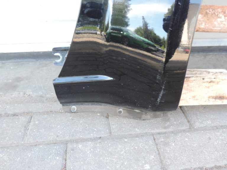 Nissan Navara II D40 priekšējais labais spārns, krāsa GN0, melns, F31004X0MA