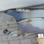 Nissan Navara II D40 priekšējais labais spārns, krāsa GN0, melns, F31004X0MA