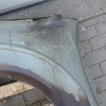Nissan Navara II D40 priekšējais labais spārns, krāsa GN0, melns, F31004X0MA