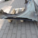 Nissan Navara II D40 priekšējais labais spārns, krāsa GN0, melns, F31004X0MA