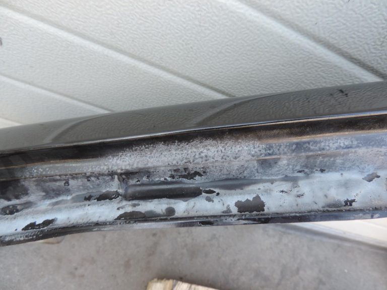 Nissan Navara II D40 priekšējais labais spārns, krāsa GN0, melns, F31004X0MA