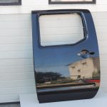 Nissan Navara II D40 aizmugurējā kreisā durvju rokturis GN0, melns 82101EB30J