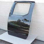 Nissan Navara II D40 aizmugurējā kreisā durvju rokturis GN0, melns 82101EB30J