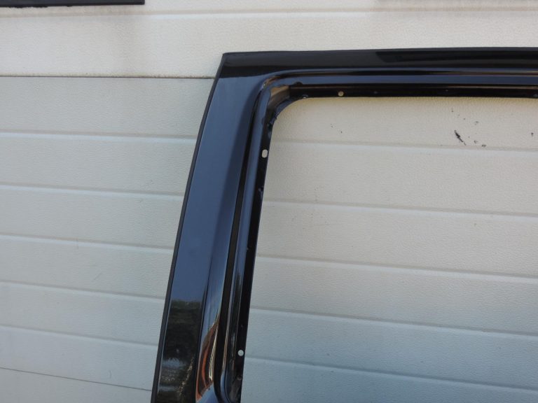 Nissan Navara II D40 aizmugurējā kreisā durvju rokturis GN0, melns 82101EB30J
