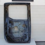Nissan Navara II D40 aizmugurējā kreisā durvju rokturis GN0, melns 82101EB30J