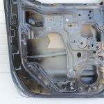Nissan Navara II D40 aizmugurējā kreisā durvju rokturis GN0, melns 82101EB30J