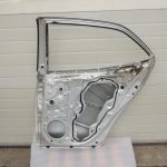 Toyota Corolla E210 E21 aizmugurējā labā durvī 6700302540 OE oriģināldetaļa