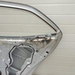 Toyota Corolla E210 E21 aizmugurējā labā durvī 6700302540 OE oriģināldetaļa