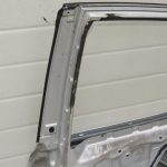 Toyota Corolla E210 E21 aizmugurējā labā durvī 6700302540 OE oriģināldetaļa