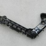 Toyota Corolla E210 oriģinālais priekšējā kreisā bampera stiprinājuma vadulis 5211602470