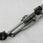 Toyota Corolla E210 oriģinālais priekšējais stikla tīrītāja motora mehānisms 8511012C80 8515002430