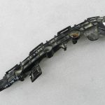 „Toyota Yaris“ oriģinālais aizmugurējais bampera stiprinājums vadītāja pusē 52575K0020