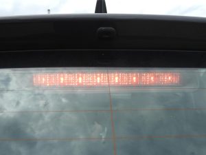 Toyota Yaris oriģinālais aizmugurējais bremžu lukturis 81006K0020