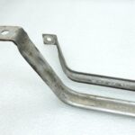 OE Toyota Corolla E21 degvielas tvertnes stiprinājumu komplekts 77602F4010 77601F4010