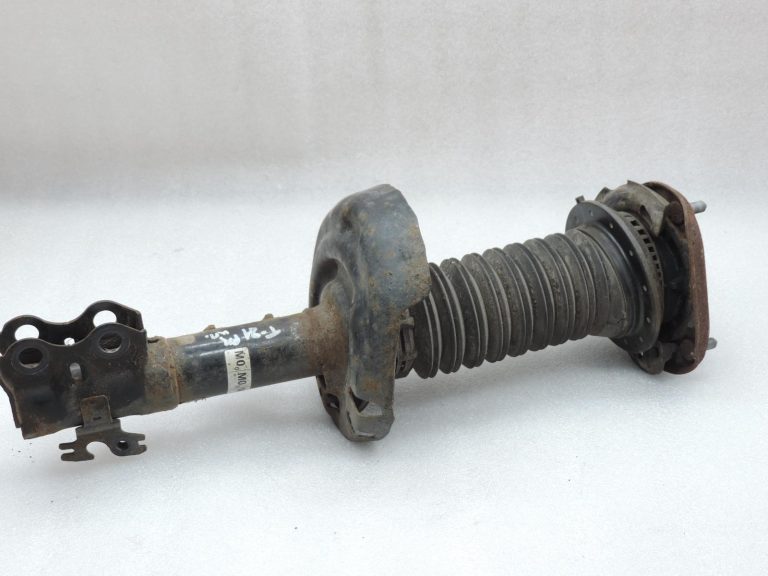OE Toyota Corolla E21 priekšējais kreisais amortizators 485208Z244